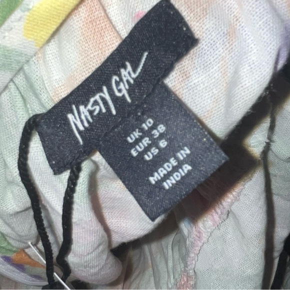 NastyGal
Ruffle Floral Plunge Tie Back Mini Dress - Picture 5 of 6